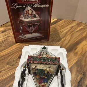 Kirkland Signature Rotating Pyramid Waterglobe with Red and Green Details